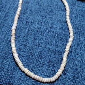 Speckled Rounded Puka Shell Necklace